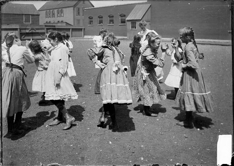 Girls at vacation school playing in the yard. Image of girls at vacation school playing in the yard in Chicago, Illinois. Source: DN-0001456, Chicago Daily News negatives collection, Chicago History Museum. Date: 1903 Aug. 11.