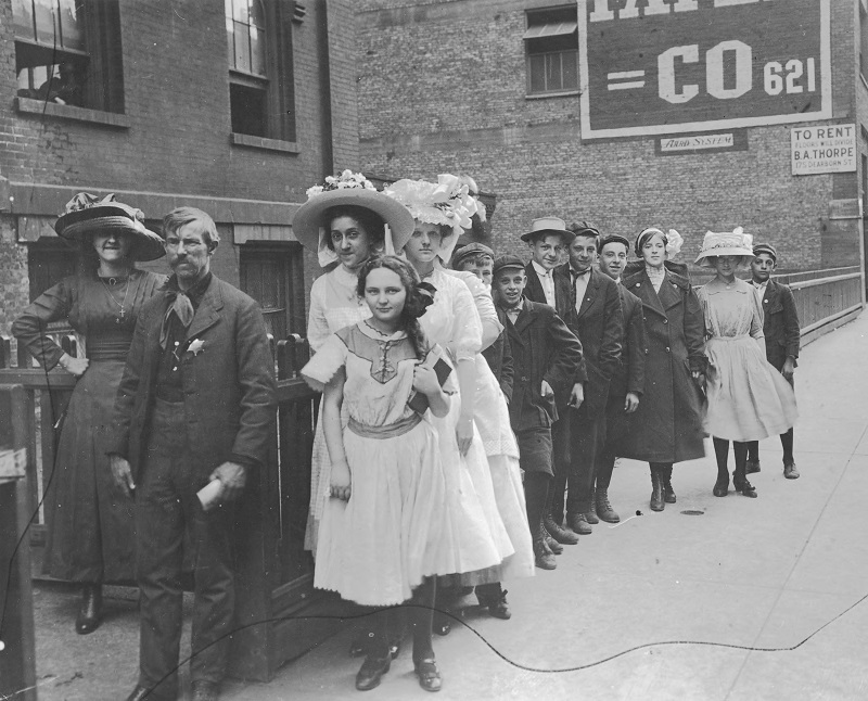 Children waiting for work permits. Description: Children waiting for work permits; Chicago, IL. Source: ICHi-21017. Chicago History Museum. Reproduction of photographic print, photographer unknown. Date: 1911.