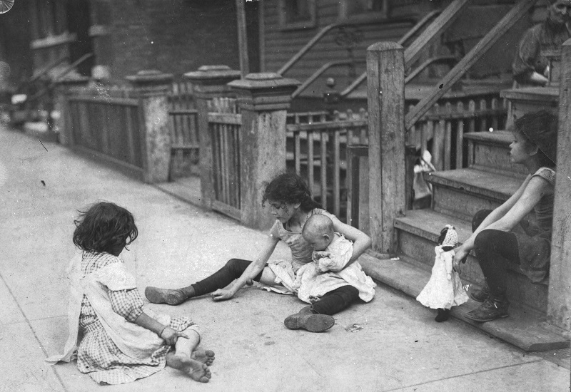 Group of children on street. Description: Group of children on street; Chicago, IL. Source: ICHi-24067. Chicago History Museum. Reproduction of photograph, photographer unknown. Date: ca. 1905.