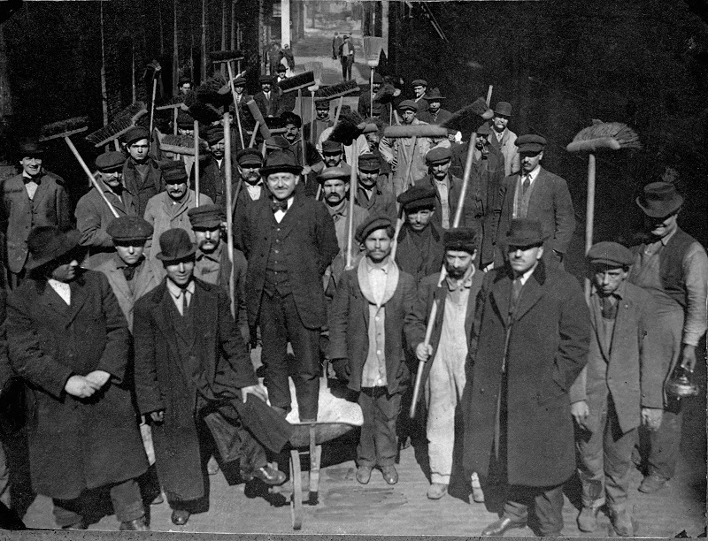 Unemployed men being used to sweep streets. Description: Unemployed men being used to sweep streets, Chicago, IL. Source: ICHi-03914. Reproduction of photograph, photographer unknown. Date: n.d.