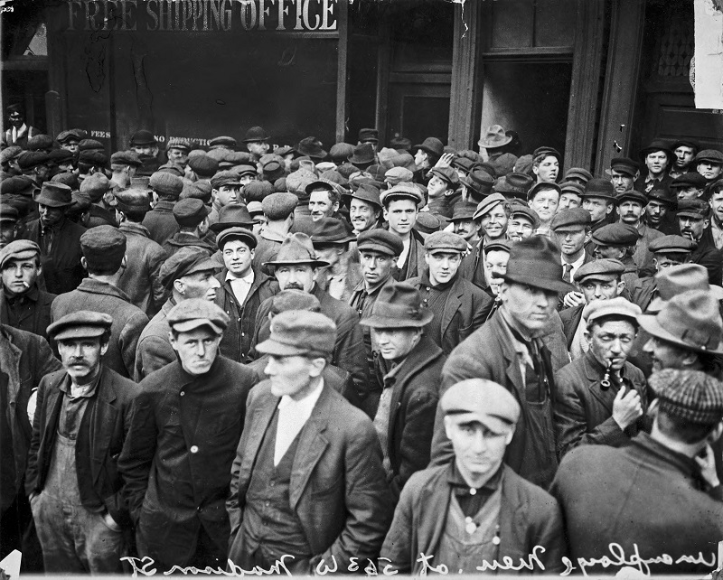Unemployed men at 563 West Madison Street. Description: Unemployed men at 563 West Madison Street; Chicago, IL. Source: ICHi-05598. Chicago History Museum. Reproduction of photograph, photographer unknown. Date: n.d.
