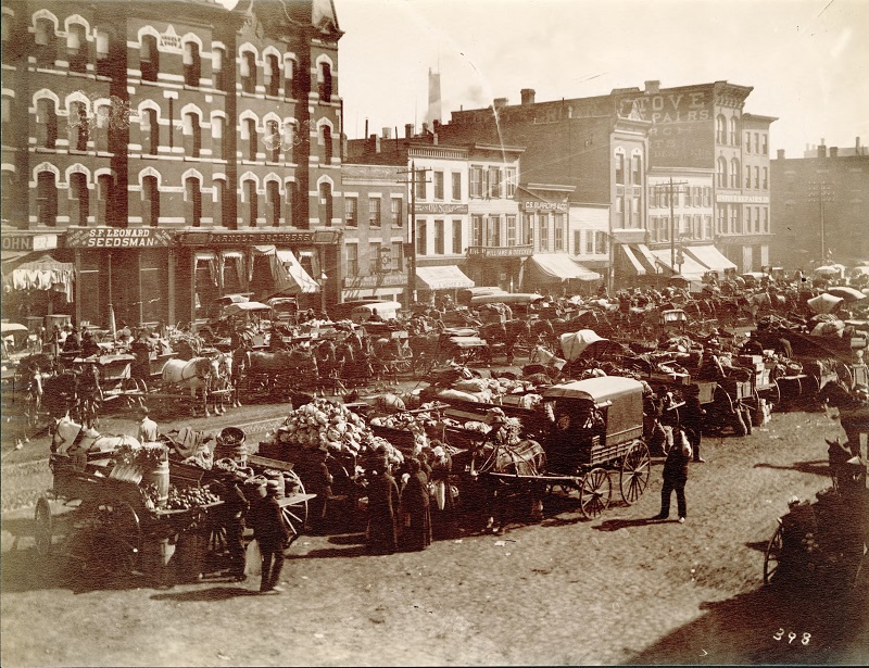 View of Randolph Street Market, west of Des Plaines Street. Description: View of Randolph Street Market, west of Des Plaines Street, Chicago, IL. Source: ICHi-31327. Chicago History Museum. Reproduction of photographic print, photographer - John W. Taylor. Date: ca. 1890.